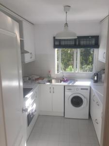 Kuchyň nebo kuchyňský kout v ubytování Apartamento del paraiso + 18 fotografií