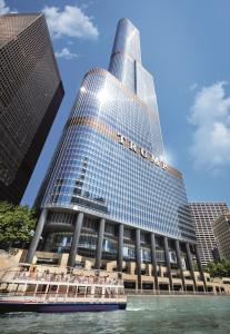 a large building with a clock on top of it at Trump International Hotel & Tower Chicago in Chicago