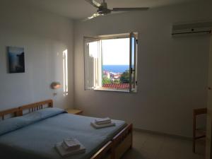 Postel nebo postele na pokoji v ubytování Albergo Marla