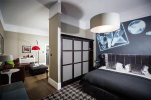 A bed or beds in a room at Malmaison Glasgow