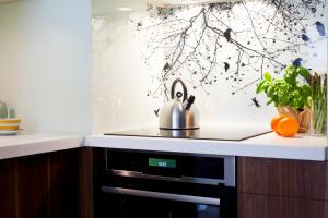 Kuchyňa alebo kuchynka v ubytovaní Apartament Wśród Drzew