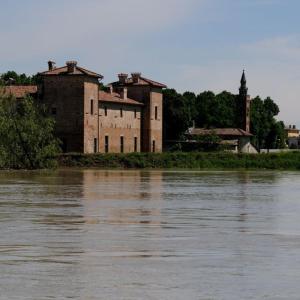 an old building on the banks of a river at Antica Corte Pallavicina Relais in Polesine Parmense