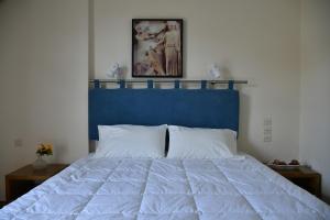 Postel nebo postele na pokoji v ubytování Hotel Hercules