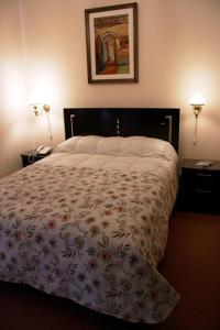 Cama o camas de una habitación en Hotel Beltran