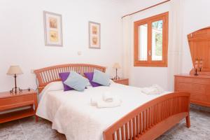 Ένα ή περισσότερα κρεβάτια σε δωμάτιο στο Pinya