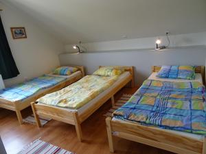 Postel nebo postele na pokoji v ubytování Rejtek Vendégház + 37 fotografií