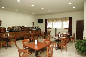 Restaurace v ubytování Budget Host Inn and Suites Cameron