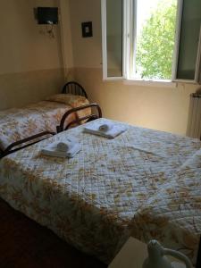 Posteľ alebo postele v izbe v ubytovaní Hotel Belvedere