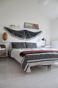 Ένα ή περισσότερα κρεβάτια σε δωμάτιο στο Genius Apartments
