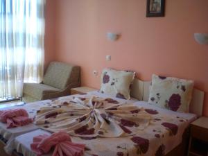 A bed or beds in a room at Hotel Sirena