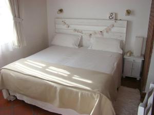Postel nebo postele na pokoji v ubytování Los Tulipanes Apart de Mar + 21 fotografií