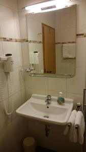 Koupelna v ubytování Hotel am Wald + 17 fotografií