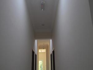 a hallway with a ceiling with a light on it at Pusat Penginapan The CityScape - Cukup Rehat & Lena Hingga Pagi in Lumut