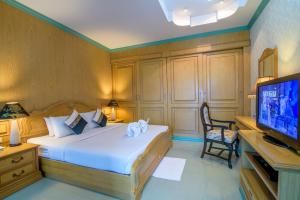 Postel nebo postele na pokoji v ubytování Hua Hin Condotel & Resort Taweeporn + 29 fotografií