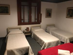 Postel nebo postele na pokoji v ubytování Hotel Antares