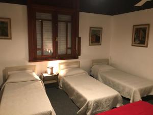 Postel nebo postele na pokoji v ubytování Hotel Antares