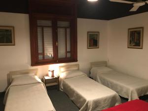 Postel nebo postele na pokoji v ubytování Hotel Antares