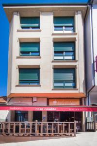 Un balcón o terraza de Pension Restaurante Casa Camiño