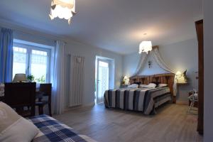 Postel nebo postele na pokoji v ubytování B&B Magiré