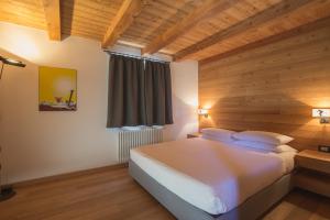 Postel nebo postele na pokoji v ubytování Hotel Centrale