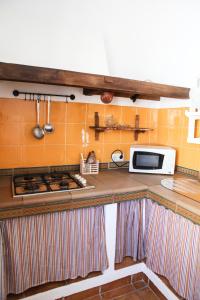 Kuchyň nebo kuchyňský kout v ubytování Casas La Pequeña Lulu