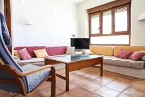 TV a/nebo společenská místnost v ubytování Casas La Pequeña Lulu