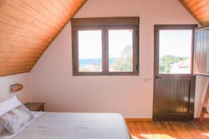 Postel nebo postele na pokoji v ubytování Casas La Pequeña Lulu