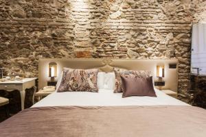 Postel nebo postele na pokoji v ubytování Hotel Palacete de Alamos