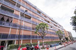 a building with motorcycles parked in front of it at Studio Couleur Soleil in Roquebrune-Cap-Martin