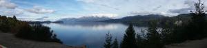 a view of a lake with mountains in the background at Dos Bahias Lake Resort in Villa La Angostura