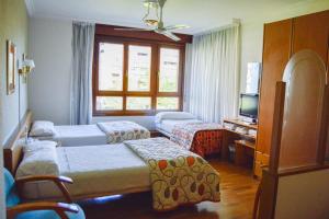 Posteľ alebo postele v izbe v ubytovaní Pension Payvi + 13 fotografií