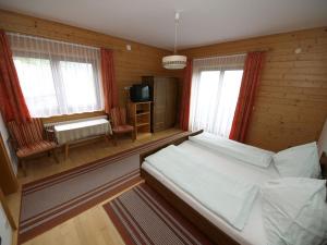 Ein Bett oder Betten in einem Zimmer der Unterkunft Frühstückspension Kärntnerhof