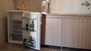 Kitchen o kitchenette sa Naša Tvrđava Guest Accommodation