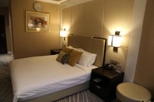Postelja oz. postelje v sobi nastanitve Ambassador Transit Hotel - Terminal 2