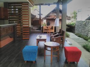 Posezení v ubytování Indraprastha Ubud Home Stay