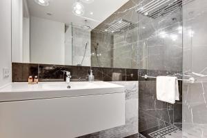 Kúpeľňa v ubytovaní Grand Apartments Wave- Na Fali
