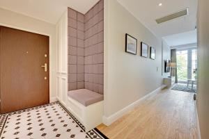 Posteľ alebo postele v izbe v ubytovaní Grand Apartments Wave- Na Fali