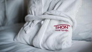 Postel nebo postele na pokoji v ubytování Thon Hotel Nordlys