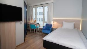 Postel nebo postele na pokoji v ubytování Thon Hotel Nordlys + 37 fotografií
