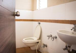 Koupelna v ubytování Hotel Aashish Deluxe Pet Friendly