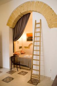 Ліжко або ліжка в номері La Culla di Adeodata