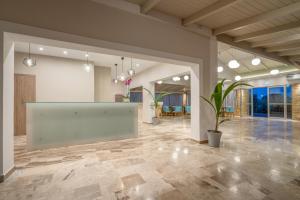a large room with a large screen in the middle at Zakynthos Hotel in Tsilivi