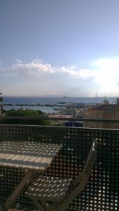 a picnic table sitting on top of a roof at Apartaments Josep Pla in Roses