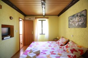 Cama o camas de una habitación en Apartment Mali Raj
