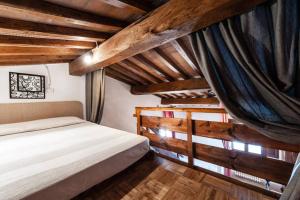 Postel nebo postele na pokoji v ubytování Antonella House -Podere della Collina