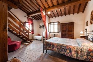Postel nebo postele na pokoji v ubytování Antonella House -Podere della Collina