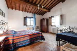Postel nebo postele na pokoji v ubytování Antonella House -Podere della Collina