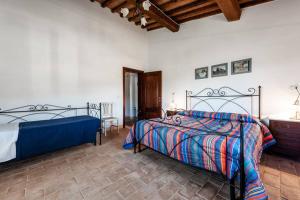 Postel nebo postele na pokoji v ubytování Antonella House -Podere della Collina + 35 fotografií