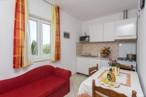 Kuchyň nebo kuchyňský kout v ubytování Apartments Mira