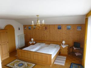 Кровать или кровати в номере Gästehaus Andreas Hofer